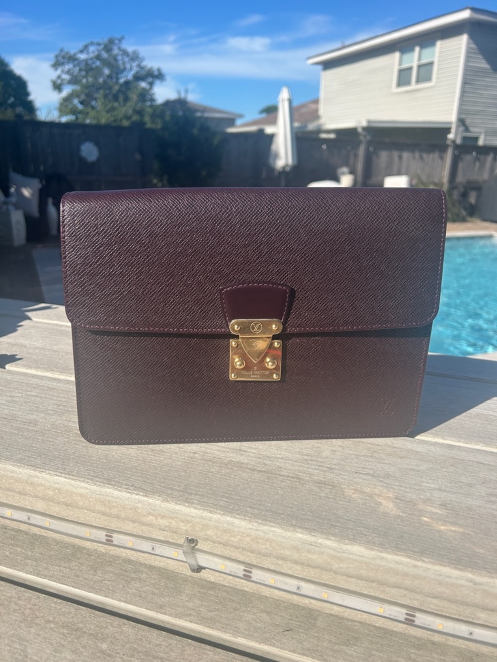 Louis Vuitton Taiga Kourad Clutch
